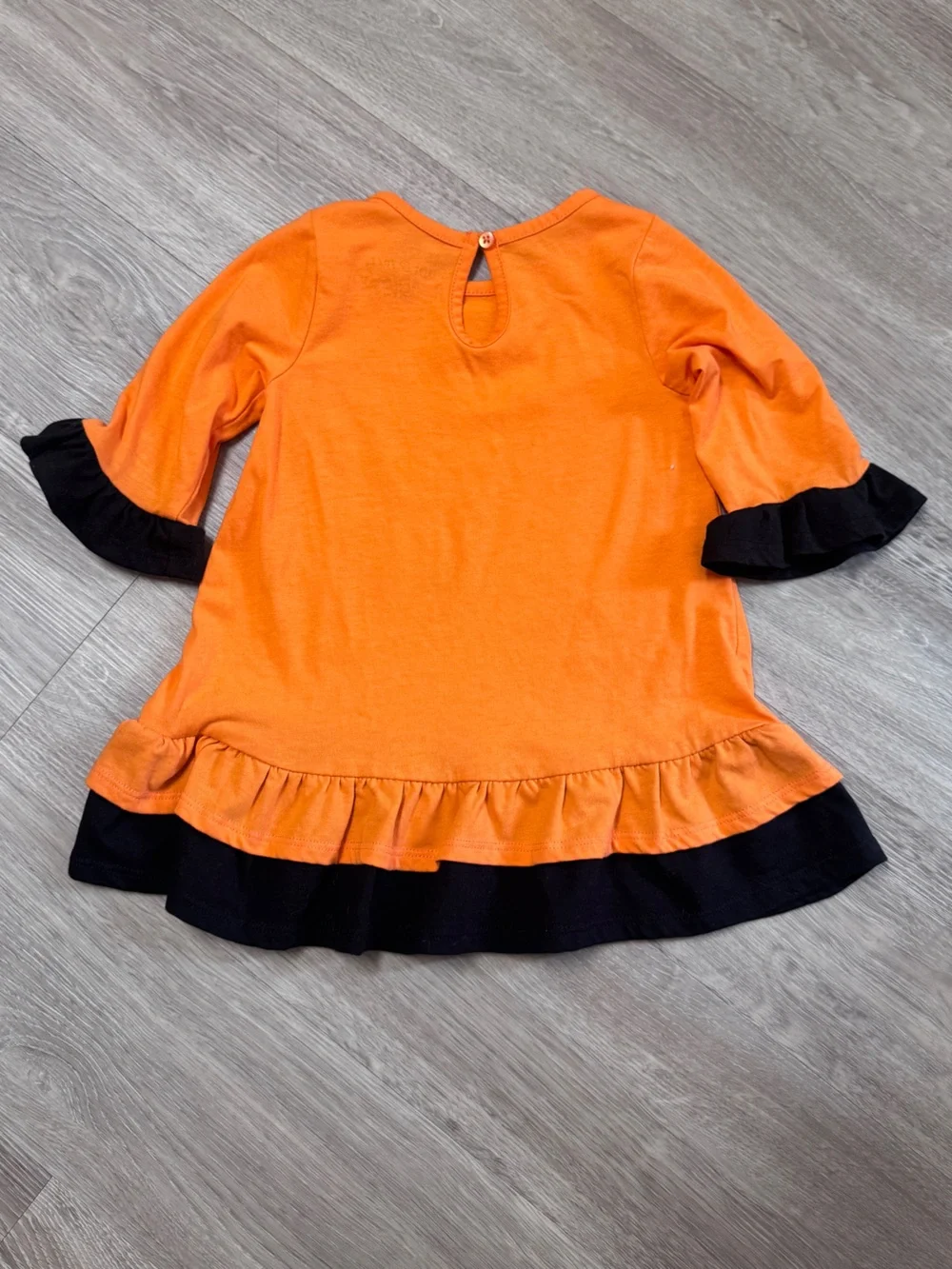 Girls Orange & Black Bat Ruffle Dress